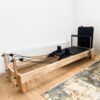 PWR Classic Wood Reformer – reformer z okvirjem iz lesa kavčukovca za profesionalno Pilates vadbo