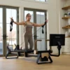 NordicTrack Ultra 1 Reformer pilates reformer | 24-palčni vrtljivi in nagibni zaslon na dotik, Tri vzmeti 10, 15 in 20 kg, Sedem kombinacij do 45 kg | Vadite po svojem načrtu - Thumbnail Image 9